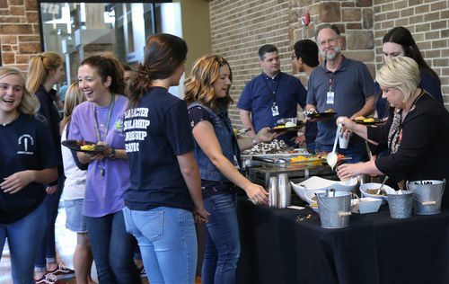 Liberty Christian teachers dig into breakfast provided by the school's National Honor Society for Teacher Appreciation Week.